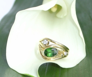 18ct Gold, wave, dress ring using a Chrome Tourmaline and Diamonds.